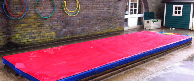 Red and blue sandpit tarpaulin