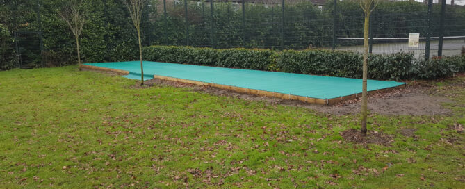 Sandpit cover for debris protection