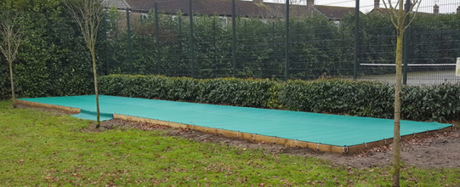 Custom sandpit cover for school