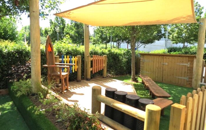 Shade sail over outdoor seating