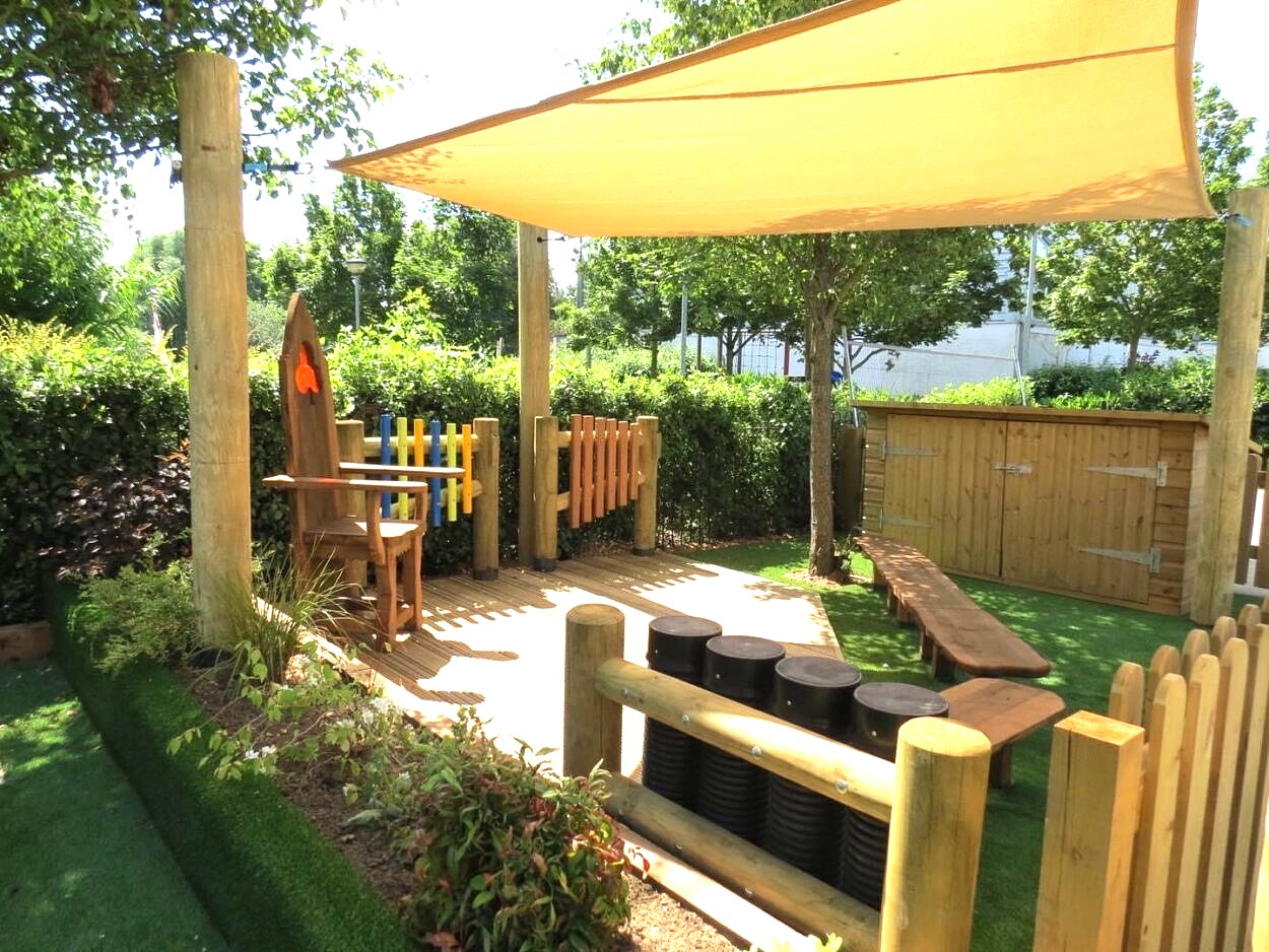Shade sail over outdoor seating