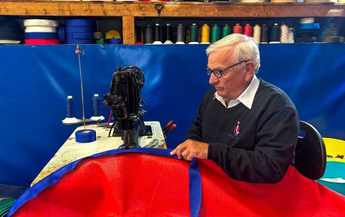 Frank Brackenbury sewing tarpaulin