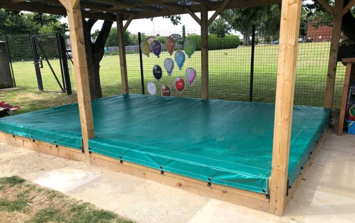 sandpit cover with post cutouts