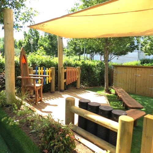 Shade sail over outdoor seating