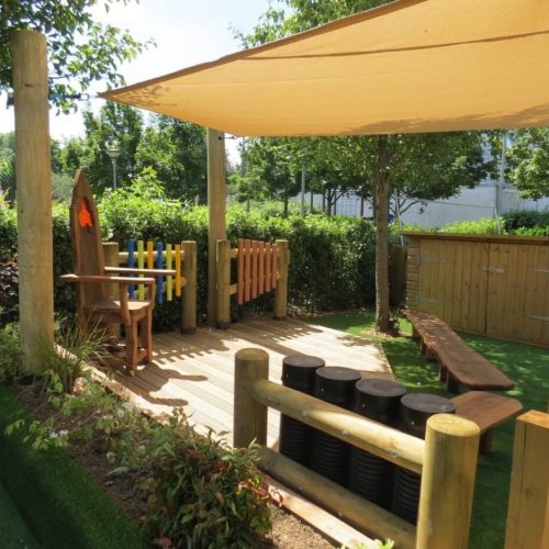 Shade sail over outdoor seating