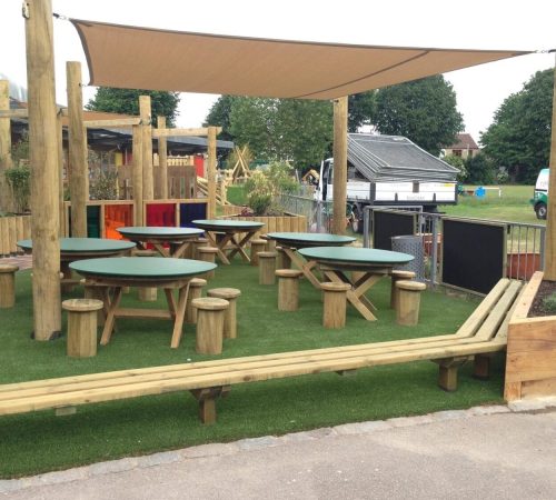 Porous beige tarpaulin shade sail